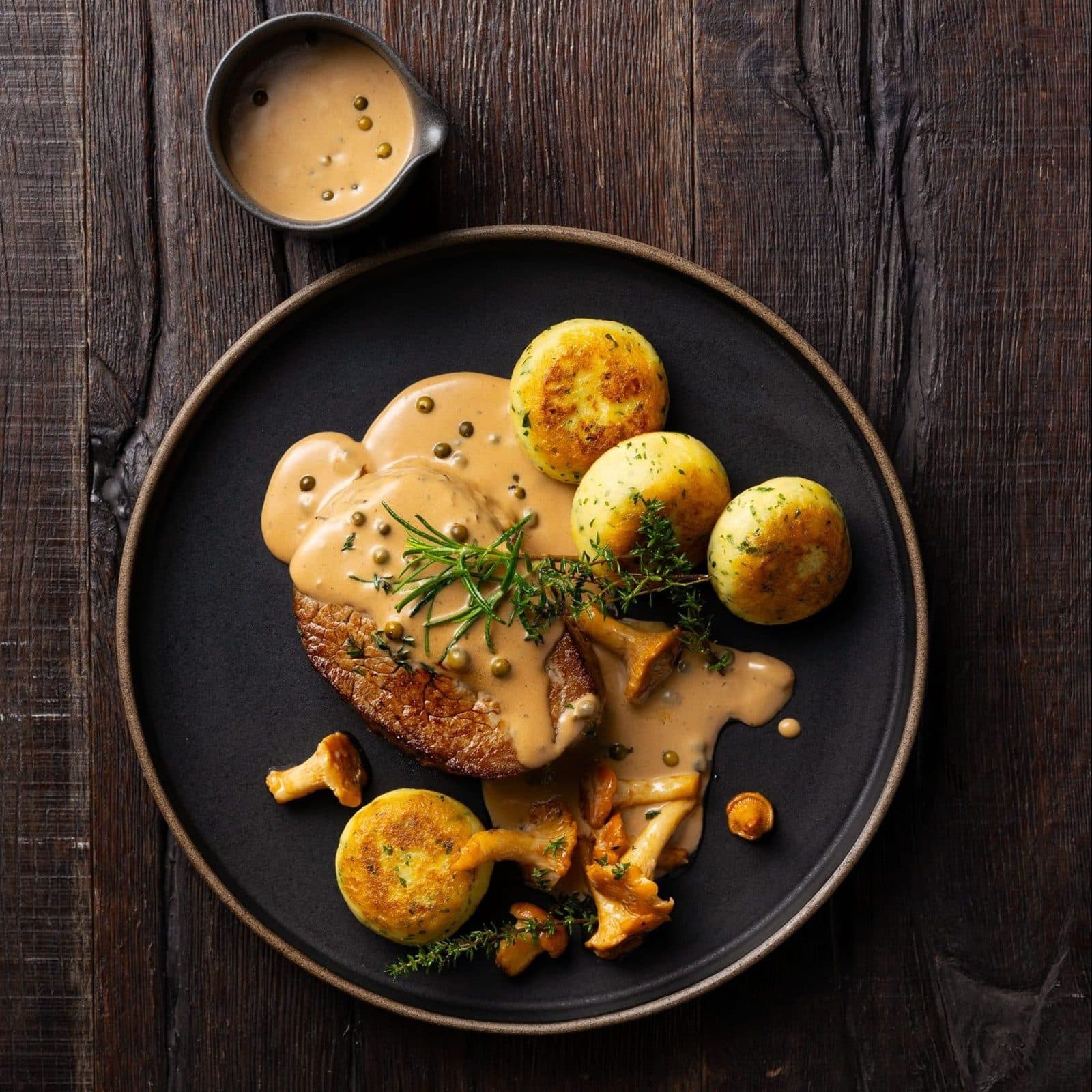 Veal escalope with fried potatoes and cucumber salad